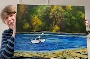 Joannie with painting of The White Kayak